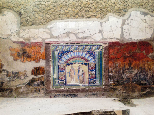 Court in the House of Neptune and Amphitrite in Herculaneum, 1st century A.D. with a mosaic of Neptune and Amphitrite on the east wall, surrounded by frescoes depicting plants and fountains; by Maria Dimitropoulos. 