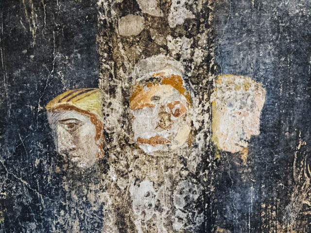 Detail from the House of Marcus Lucretius Fronto (first century CE), by Jeremy Simmons. This was one of my favorite houses in Pompeii proper. The faces take on almost a grotesque appearance due to their abstracted features (and the damage to the paint over time).